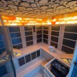 How Does Your Home Sauna Work? A Complete Home Sauna Guide 6 Cozy wooden sauna interior with lighting