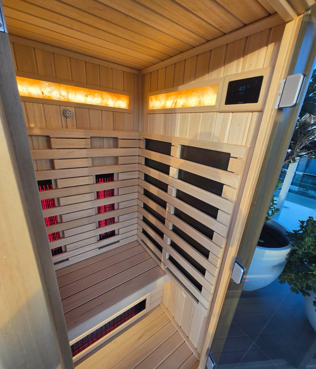 Outdoor sauna cabin at dusk